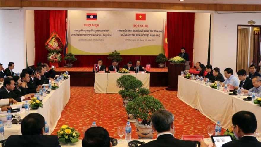 Vietnamese, Lao border localities share experience in religious affairs