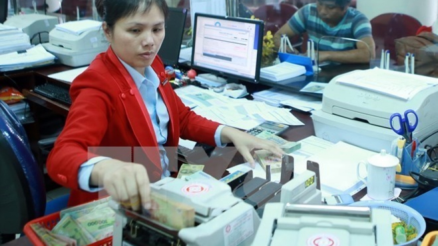 Reference exchange rate down by VND2 at week’s beginning