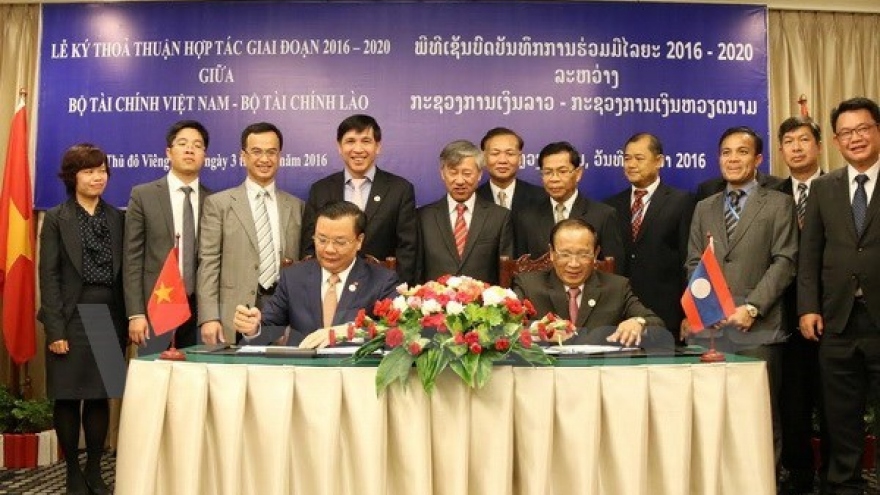 Vietnam, Laos enhance financial cooperation