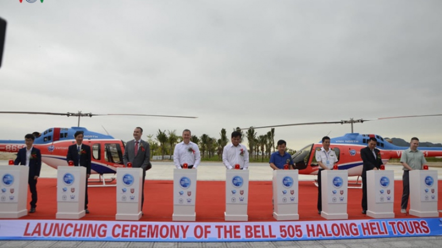 Visitors savour spectacular views of Ha Long bay by Bell 505 helicopter