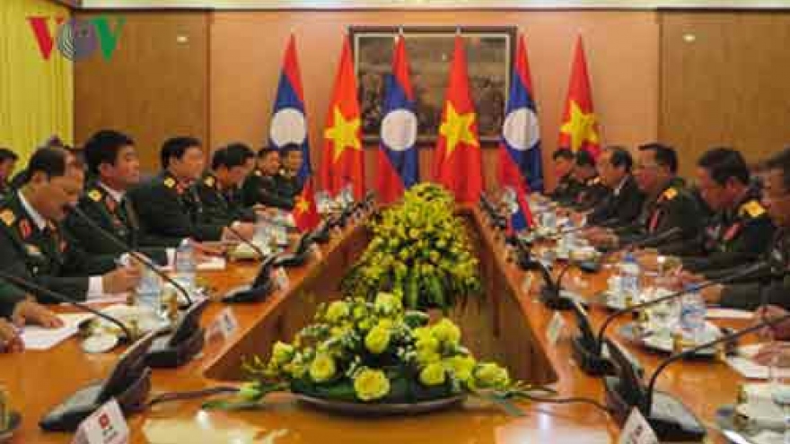 Vietnam, Laos enhance defence links