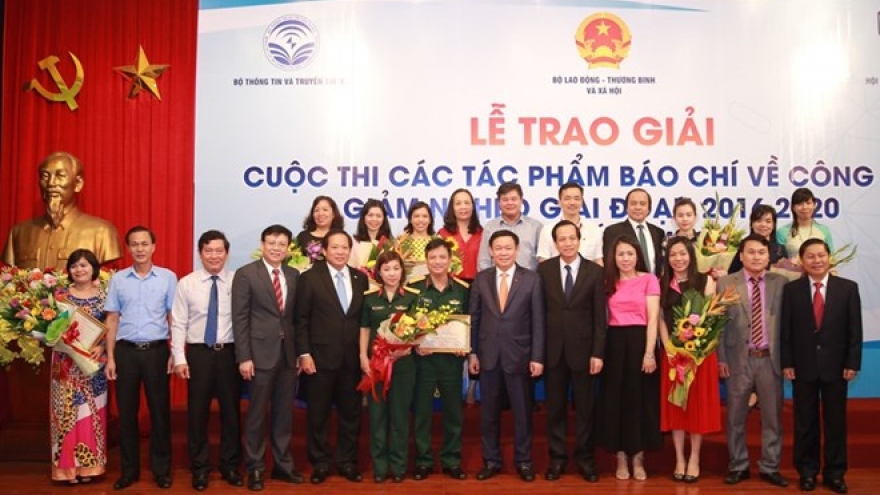 Winners of press awards on poverty reduction effort honoured