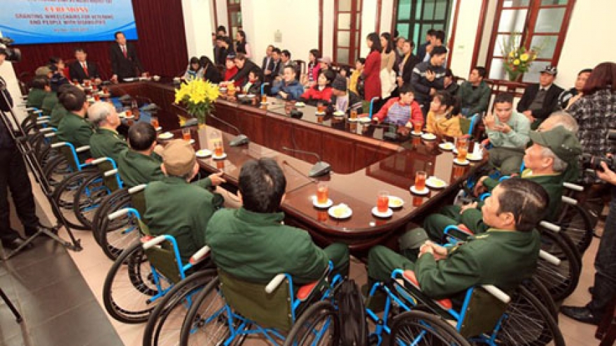 Wheelchairs given to war invalids, disabled people