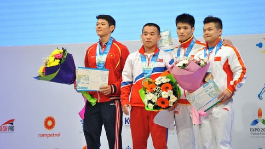 Weightlifter Tuan wins gold at World Champs
