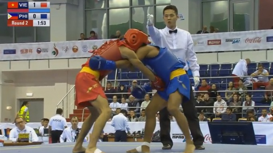 Wushu fighter finds gold after 16 years for Vietnam 
