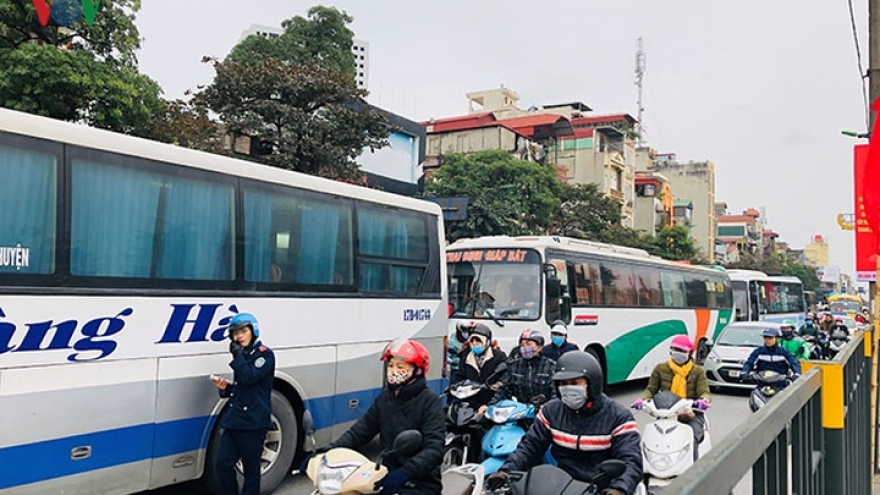 Bus stations busy as thousands return home to celebrate New Year holiday