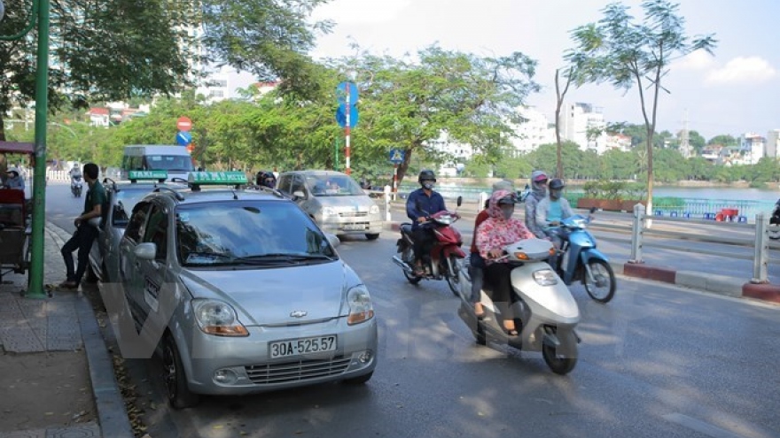 Carpool service GrabShare makes debut in HCM City