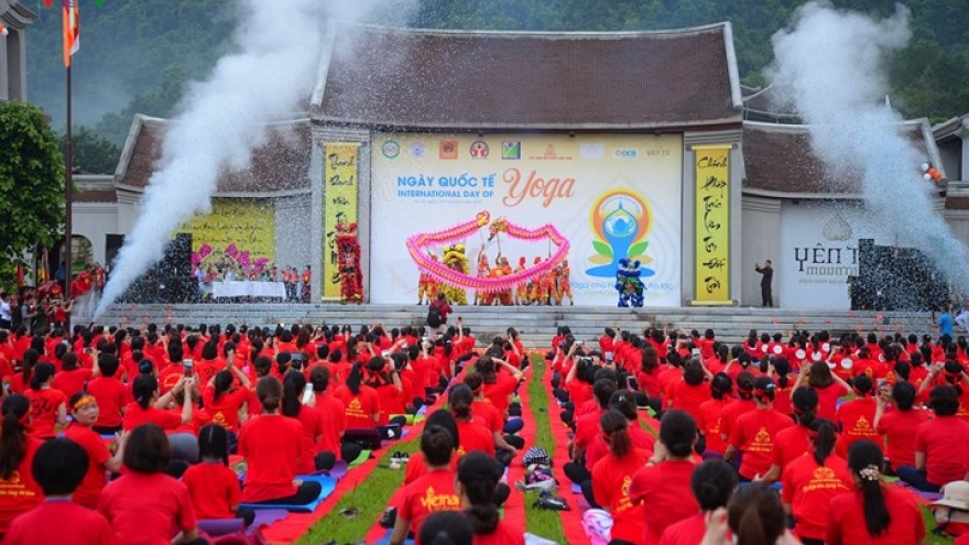 Hundreds of yogis perform at the foot of Yen Tu Mountain