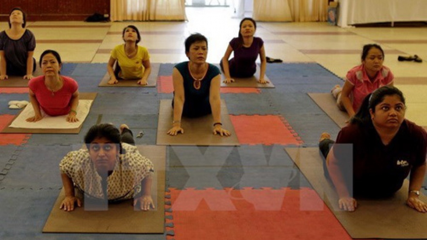 
        Danang programme responds to Int’l Yoga Day
                              
