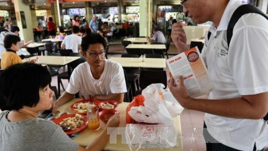 Singapore reviews regulation isolating potential Zika-infected patient