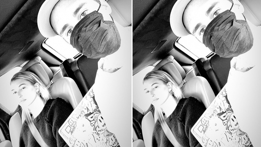 Justin Bieber đeo khẩu trang kín mít, lái xe chở vợ ra phố