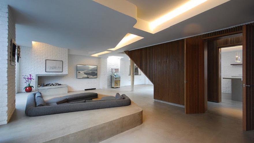 Không gian độc đáo của ngôi nhà có phòng khách được thiết kế chìm