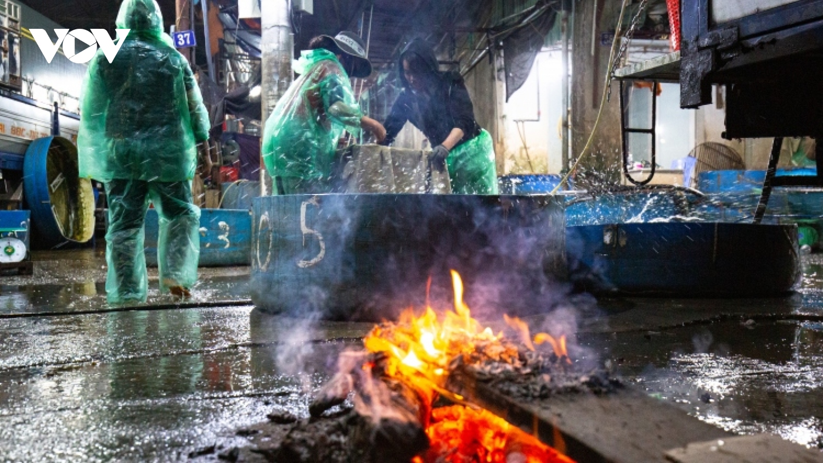 Hanoi's outdoor workers make a living on freezing cold nights