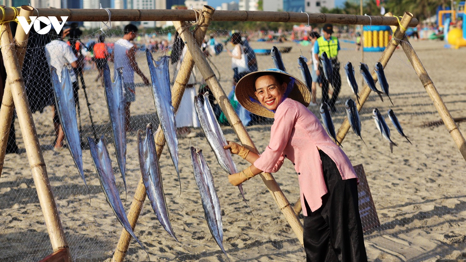 Man Thai fishing village awakens at dawn by the sea in Da Nang