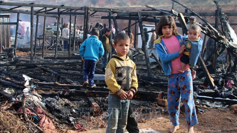 Children at a refugee centre in Yammouneh, Bekaa Valley, Lebanon.jpg