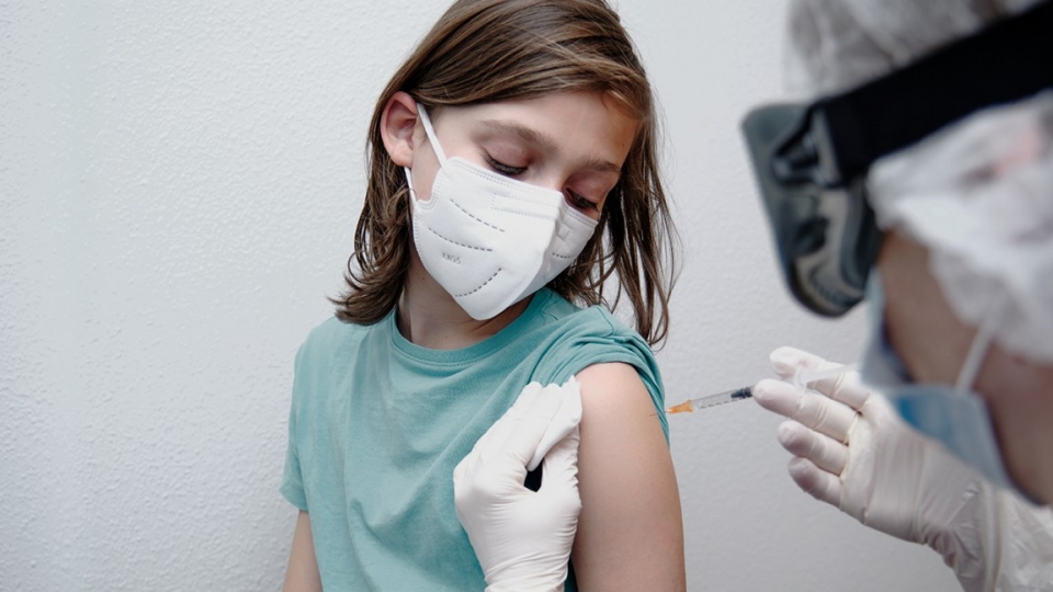 doctor-giving-boy-covid-19-vaccine-facemask-1296x728-header.jpg