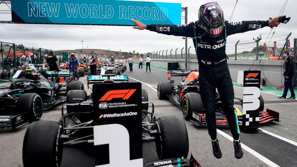 lewis-hamilton-leaps-out-of-his-mercedes-after-securing-a-record-92nd-victory-in-portimao-at-the-2020-portuguese-grand-prix.jpg