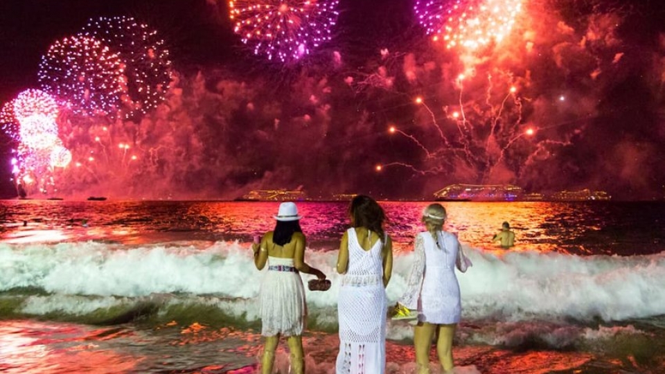 women-standing-in-waves-in-brazil.jpg