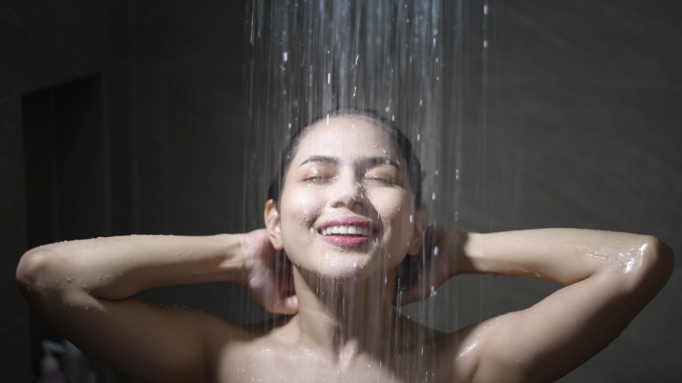 young-beautiful-woman-taking-shower-in-a-bathroom-at-home-free-photo_1.jpg