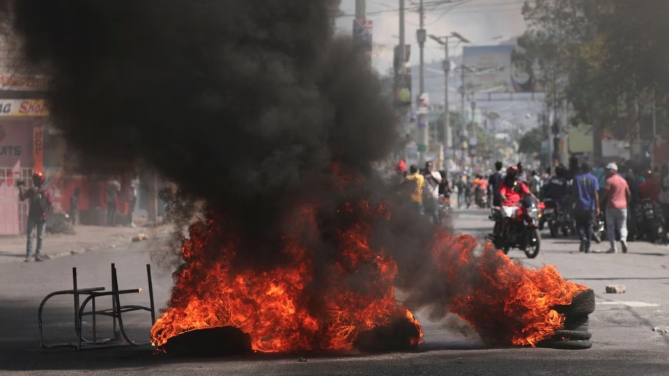 bao luc Haiti, bao luc bung phat, bao luc bang dang  thang 3-2024 -reu.jpg