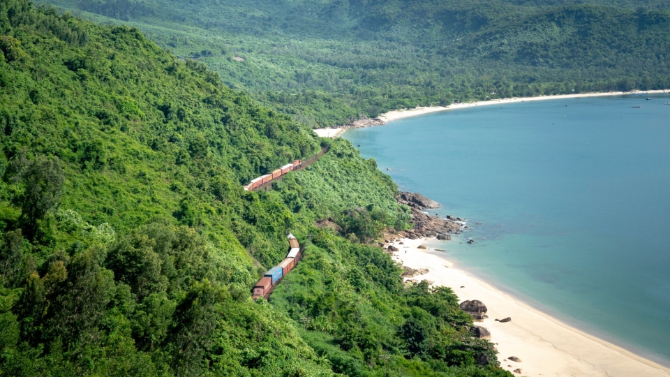 the_revolution_express_will_traverse_the_train_line_along_coastal_mountains_pictured_adjacent_to_the_hai_van_pass_in_central_vietnam_twice_a_day.jpeg