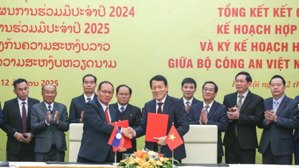 Vietnamese and Lao ministries of public security elevate cooperative ties