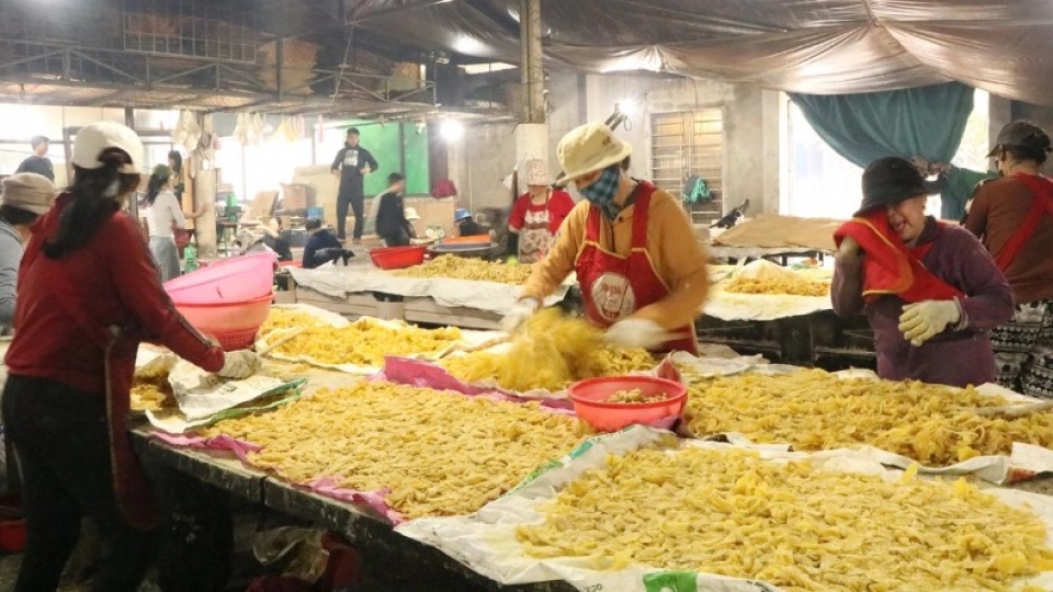 Ginger jam village in central Vietnam bustling in the buildup to Tet