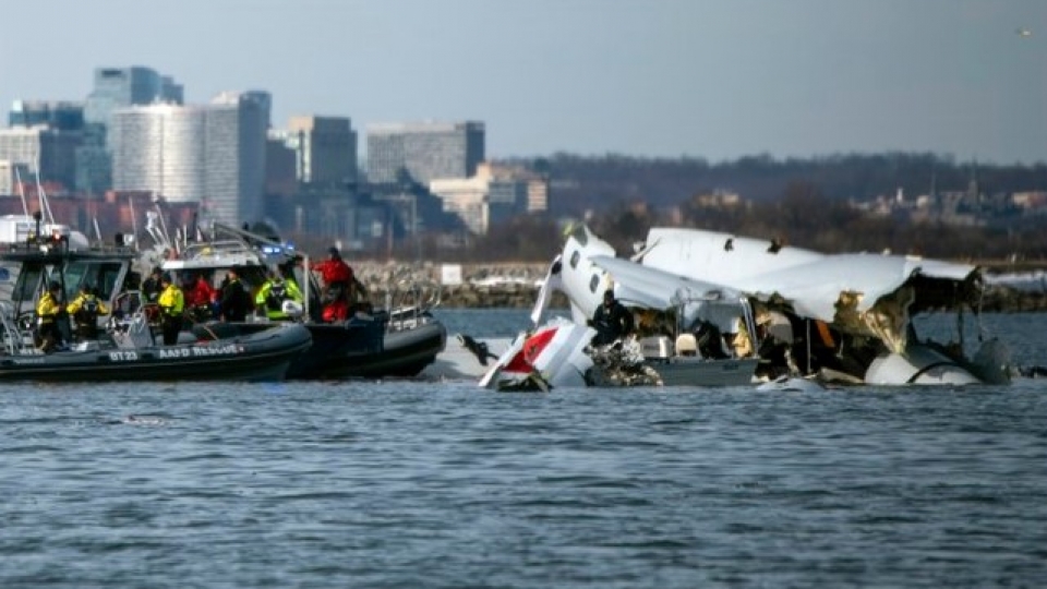 Two planes collide in mid-air and fall into the Potomac River..jpg