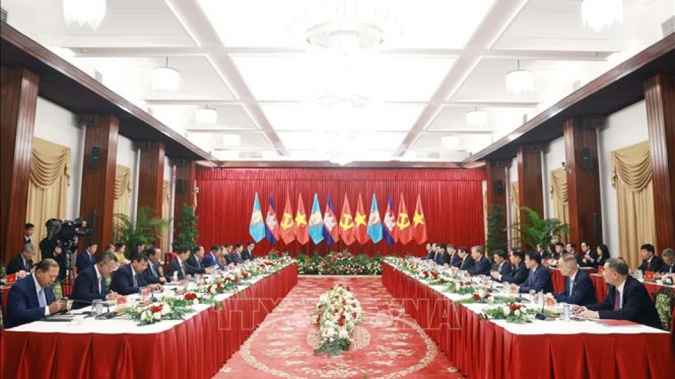 vna_potal_cuoc_gap_cap_cao_giua_bo_chinh_tri_dang_cong_san_viet_nam_va_ban_thuong_vu_dang_nhan_dan_campuchia_stand_3.jpg