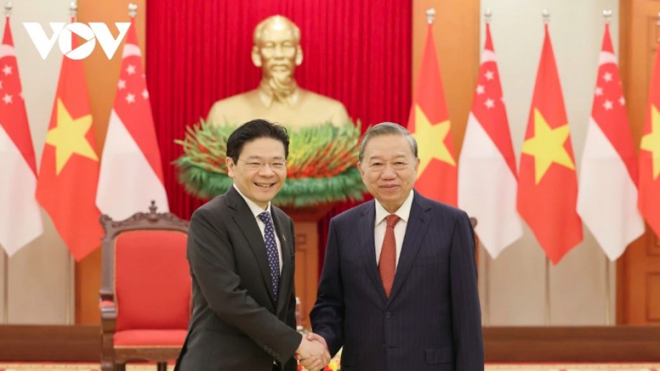 Party leader To Lam and Singaporean PM pict 1.jpg