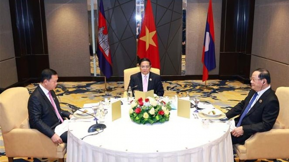 Prime Minister Pham Minh Chinh held a working breakfast with his Lao and Cambodian counterparts.jpg
