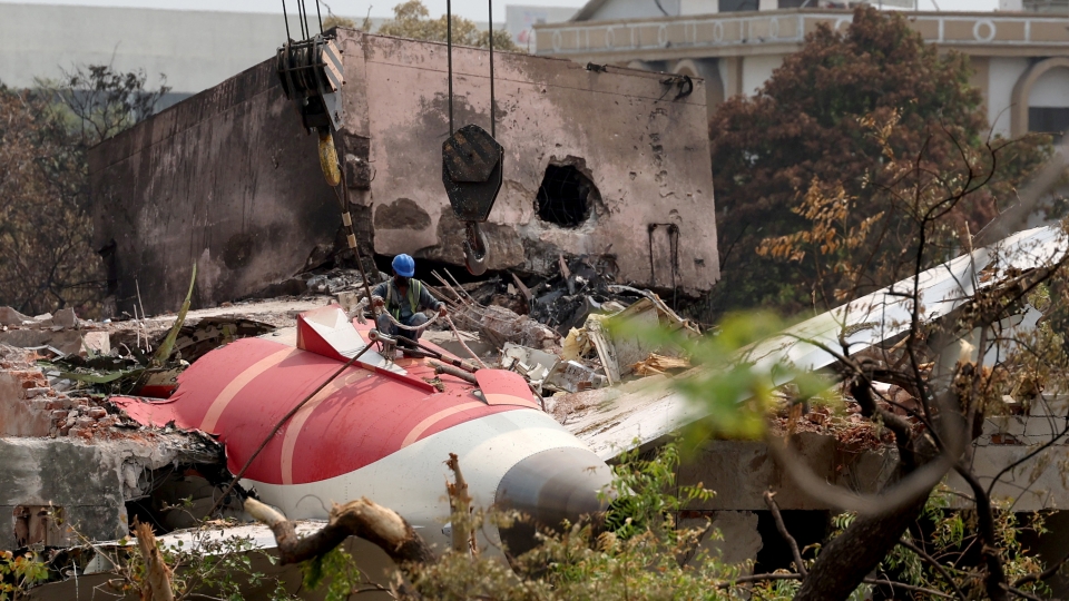 2025-06-14T102307Z_1837719806_RC292FAHPOS2_RTRMADP_3_INDIA-CRASH.JPG