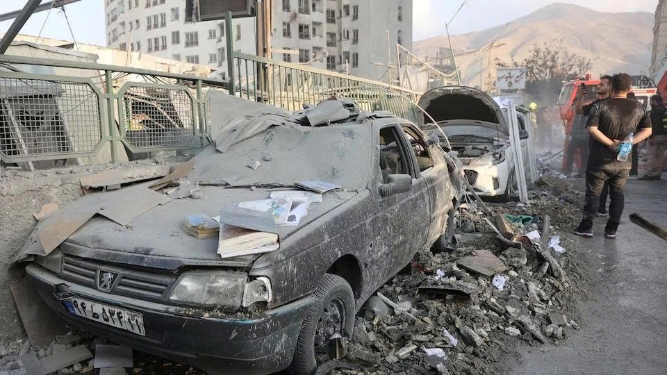 Cars in Tehran have been severely damaged by Israel's air strikes on June 13.jpg