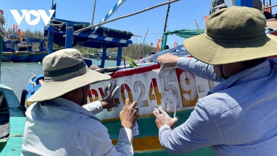 Vessel identification numbers are attached to the hulls of fishing boats to monitor their entry and exit activities in Ba Ria – Vung Tau..jpg