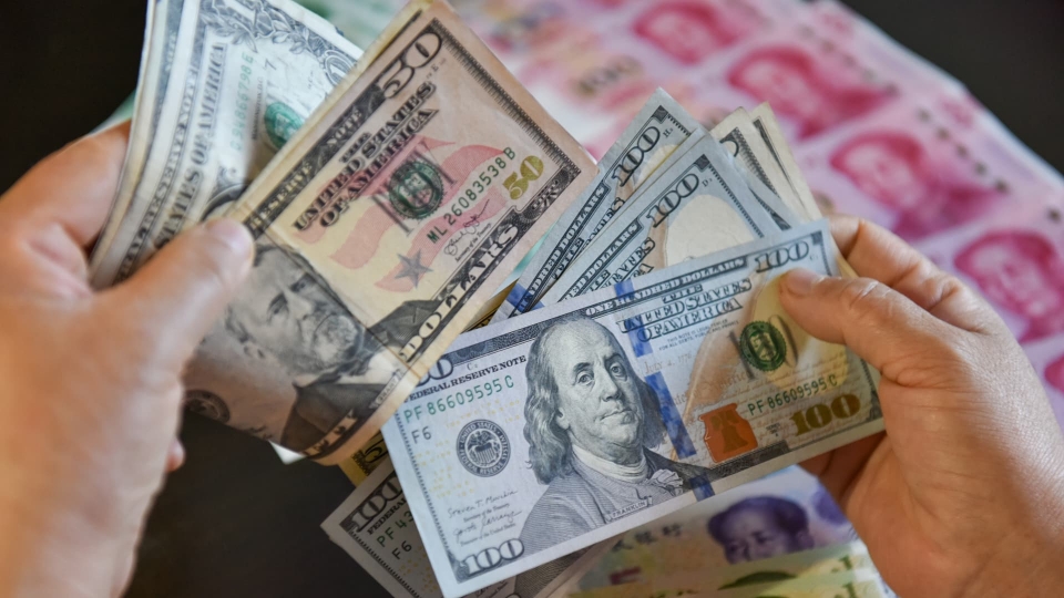 107303460-1695192223959-gettyimages-1631566525-usd_and_rmb.jpeg