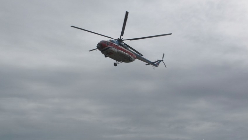 Helicopter deployed to assist people in flood-isolated areas