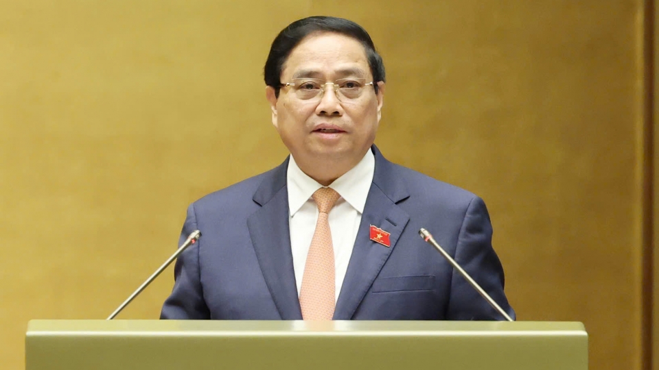 Thu tuong Pham Minh Chinh bao cao Quoc hoi.jpeg