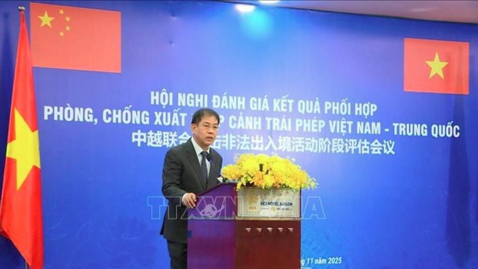 Leader of Vietnam’s Immigration Department speaks at the conference.jpg