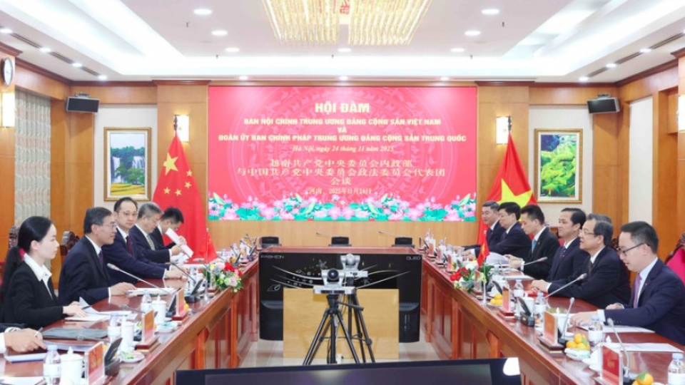 Vietnamese, Chinese Party commissions boost cooperation on internal affairs, anti-corruption.jpg