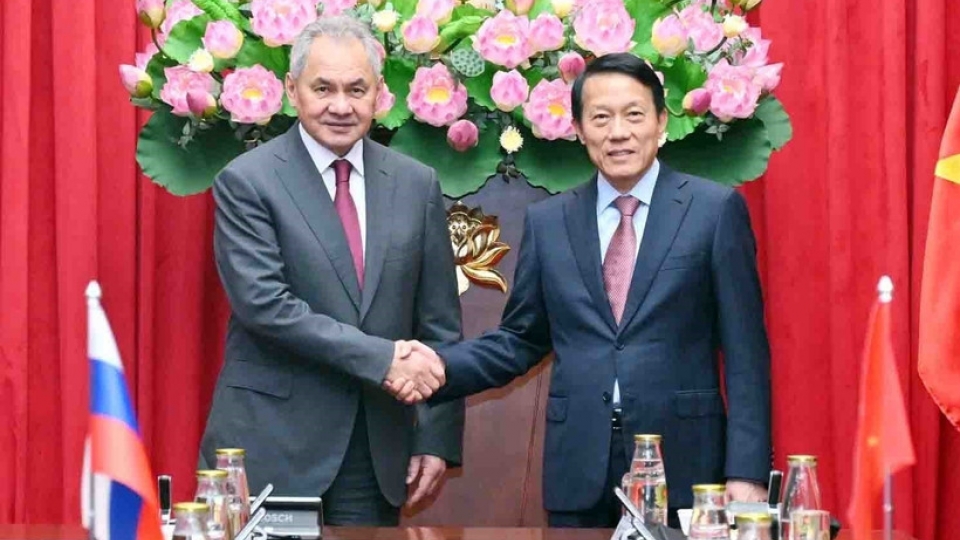 Minister of Public Security General Luong Tam Quang (right) and Secretary of the Russian Federation Security Council Sergei Shoigu at their meeting in Hanoi on December 9.jpg