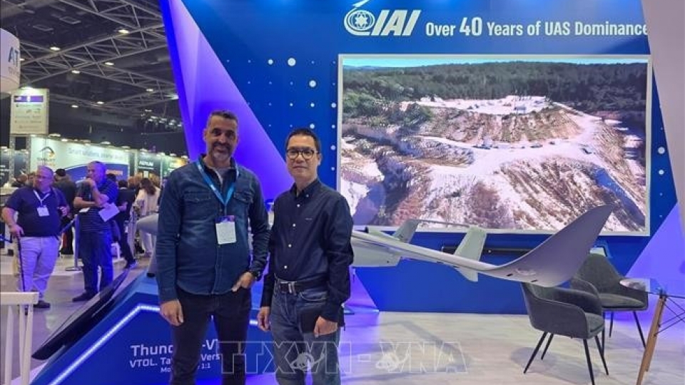 Vietnam’s Trade Counsellor in Israel Le Thai Hoa at Unmanned Vehicles Israel Defense DroneTech exhibition.jpg