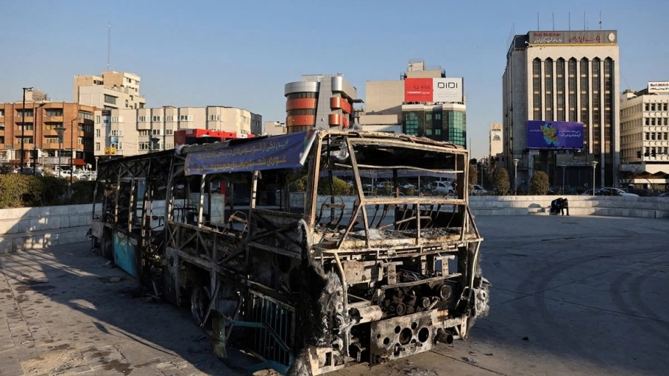 A bus is set ablaze during a protest in Tehran, Iran, January 16, 2026..jpg