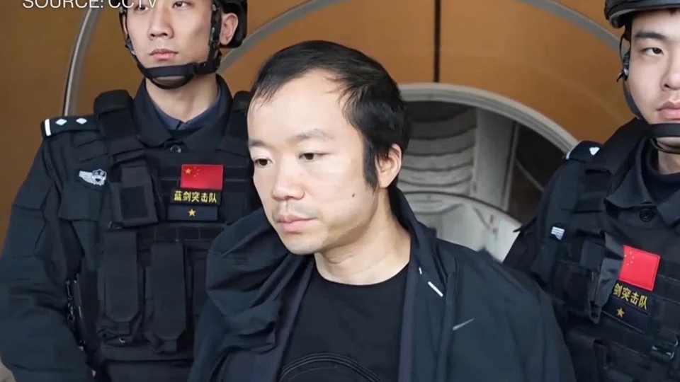trum lua dao Tran Chi bi cong an Trung Quoc bat giu -cctv.jpg