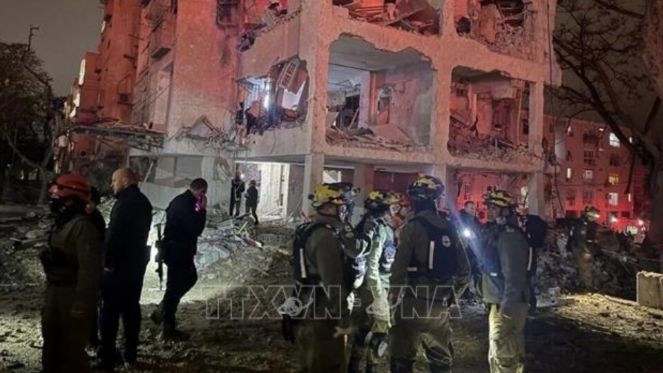 Emergency responders at the scene of an Iranian ballistic missile attack.jpg