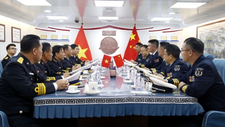 Vietnamese and Chinese navies meet ahead of joint patrol and training.jpg