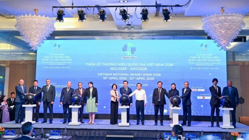 Delegates perform the opening ceremony for Vietnam National Brand Week 2026.jpg