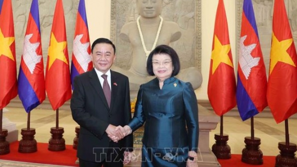 Politburo member and Permanent member of the Party Central Committee’s Secretariat Tran Cam Tu and Cambodian National Assembly President Khuon Sudary.jpg