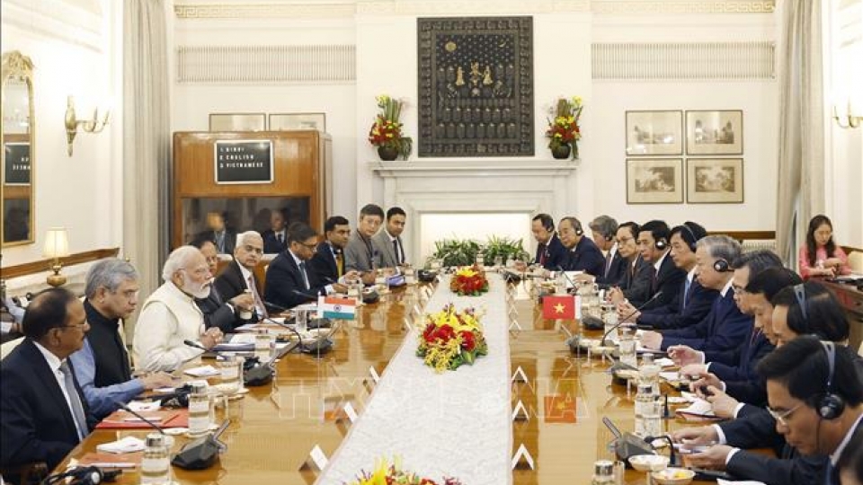 vna_potal_tong_bi_thu_chu_tich_nuoc_to_lam_hoi_dam_voi_thu_tuong_an_do_narendra_modi_stand.jpg