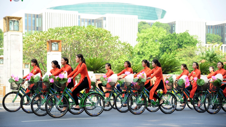 Hundreds descend on Hanoi for mass ride celebrating Ao Dai