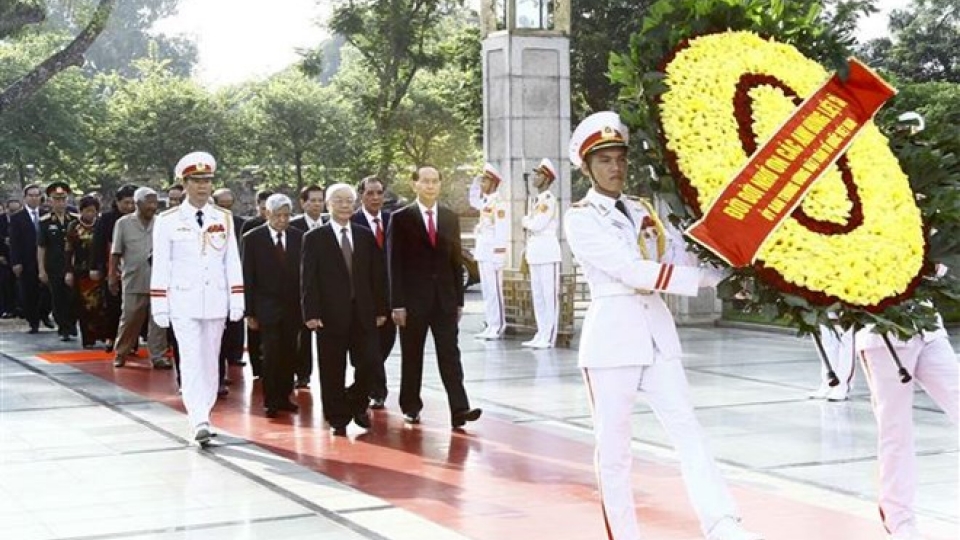 National leaders pay tribute to late leader, martyrs on National Day